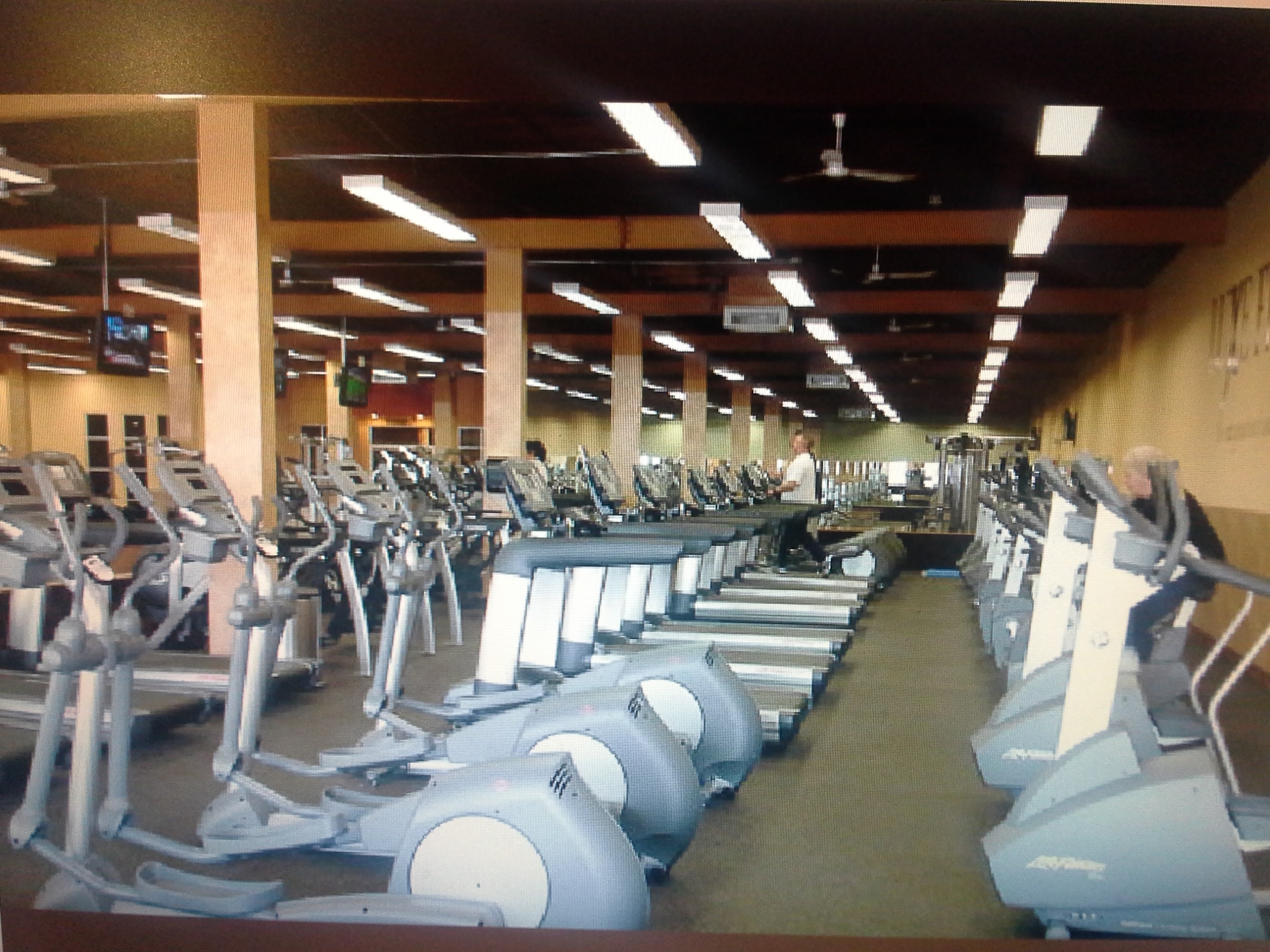 Westerly gym cardio floor with ellipticals and treadmills